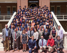 CHEE Class of 2022 graduates in front of UArizona's Old Main Building