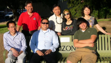 The Hom family visits the memorial bench honoring Hom Moon Jung.
