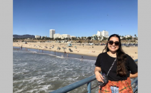 Arisbeth Ibarra Nieblas standing in front of the beach