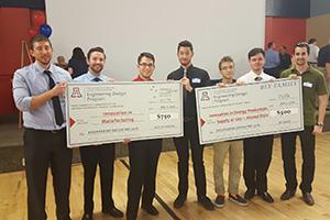Chemical engineering seniors holding their big checks from Engineering Design Day 2016